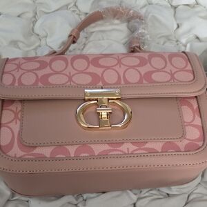 Chic Pink Shoulder Bag with Gold Accents